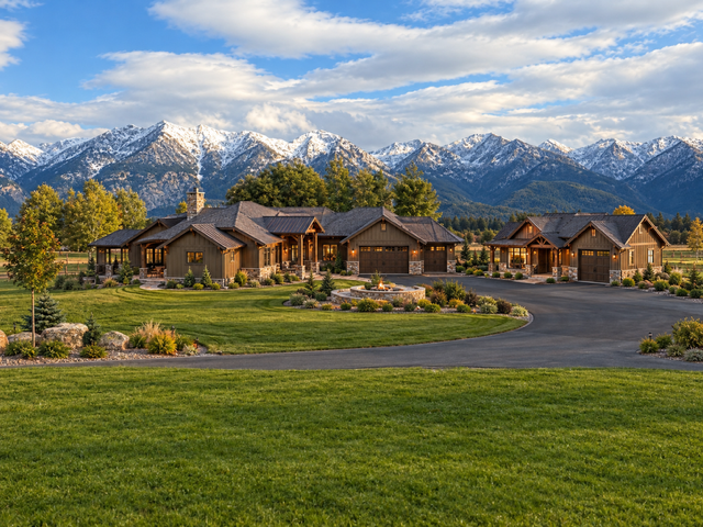 Main home and secondary residence surrounded by lawns and snowcapped mountains